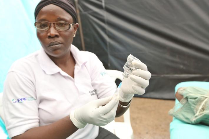 IPPF public health facility worker administers family planning to local clients