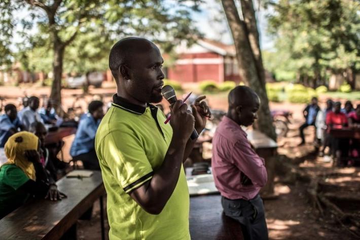 Peter, a teacher at a secondary school, talks to students about safe abortion and reproductive health during an event arranged by VODA in Kasana.