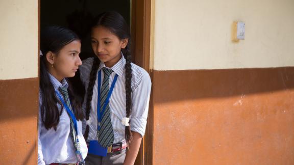School girls talking.