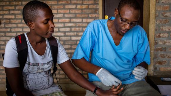 A nurse administering a HIV test