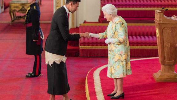 Joshua Sefesi meeting the Queen