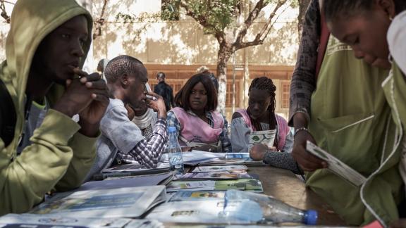 Student Fatou Bintou Diop (C), 20, attends a sex education session 
