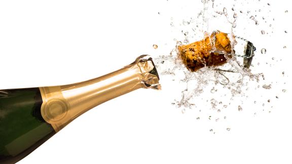 Champagne bottle with exploding cork