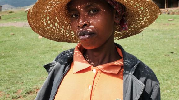 34-year-old Makamohelo Tlali, says, smiling outside the LPPA Family Planning tent on the hillside of Hamoshati village in Lesotho.