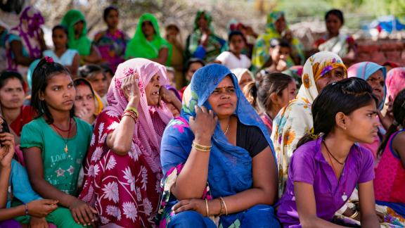 a group of women and girls in India