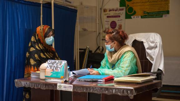 A photo from Pakistan of a woman receiving healthcare