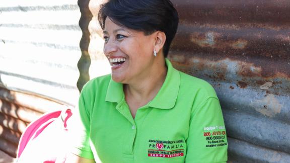 Woman laughing.
