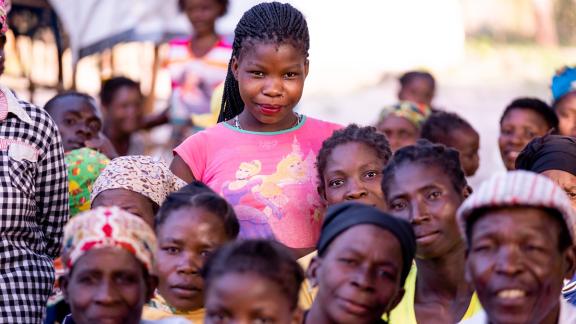 Young woman and a group 