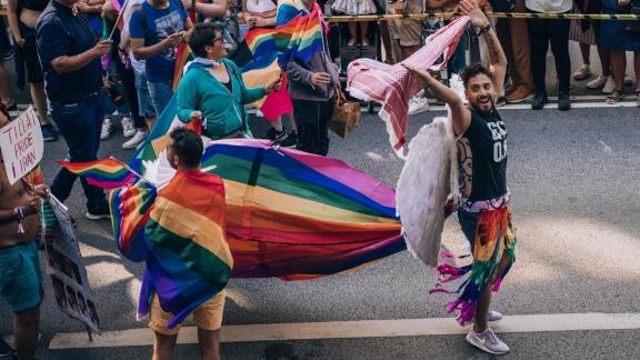 A person at a Pride parade - image by Lindsey LaMont