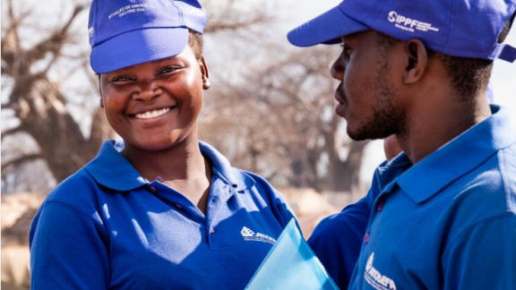 Two IPPF team members working together