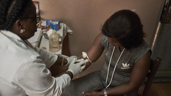 nurse with client - Cameroon